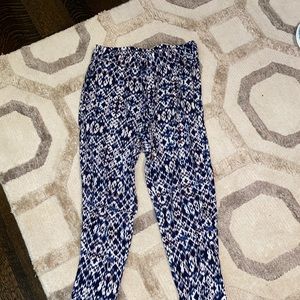 Blue patterned, flowy pants.